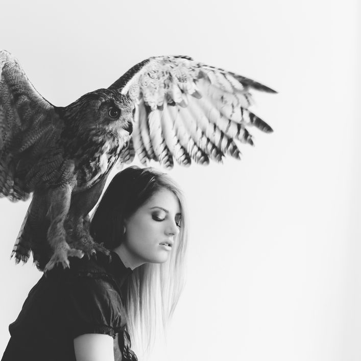 Owl On Woman's Shoulder